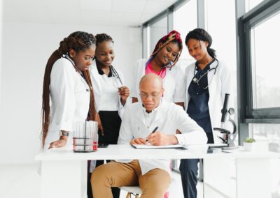 confident african medical doctor and colleagues portrait in hospital